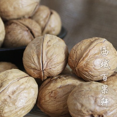 新货新疆特产阿克苏纸皮核桃烘烤类大果奶油味草本味500g批发图4